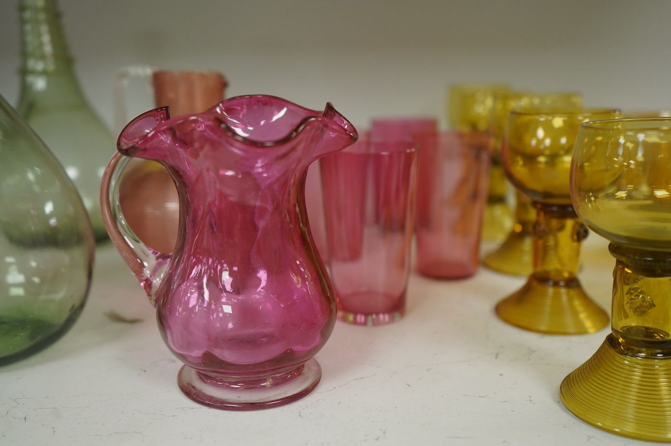 A collection of assorted coloured glassware, 18th century and later. Tallest 24cm. Condition - fair